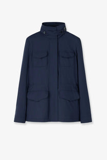 Navy blue Loro Piana women’s Traveller Windmate utility jacket with high collar and four flap pockets