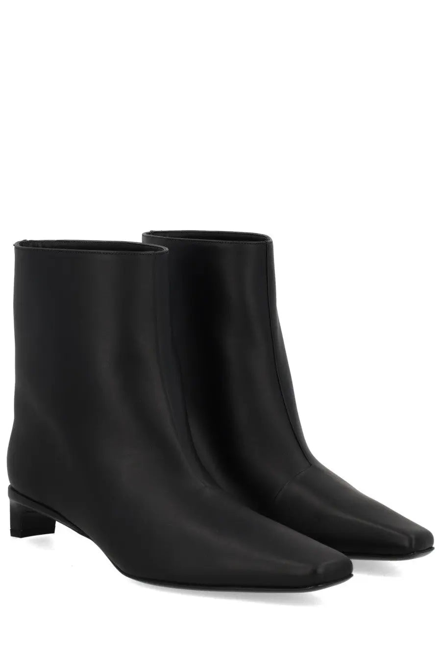 Loulou De Saison women’s black leather ankle boots with sleek minimalist design and low block heel