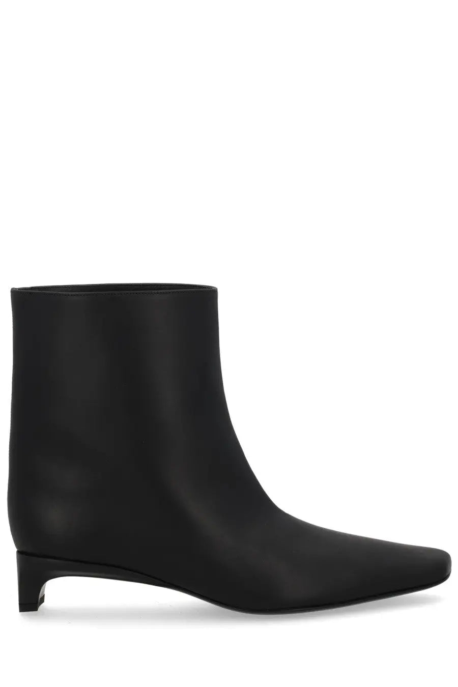 Black leather ankle boot with sleek minimalist design and low block heel from Loulou De Saison Women’s Boot Celine Lds Black