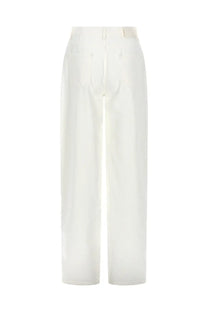White high-waisted wide-leg trousers with minimalist design and subtle back pleats from loulou de saison