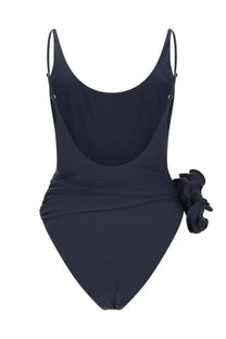 Magda Butrym women’s navy blue one-piece swimsuit with thin straps and a large black flower on the hip