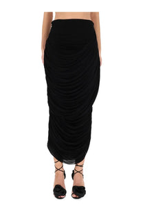 Black ruched midi skirt by magda butrym featuring a flowing draped design perfect for elegant occasions