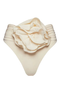 Cream-colored high-waisted bikini bottom by Magda Butrym featuring a large ruched fabric rose appliqué at the front