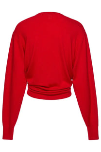 Vibrant red cropped cardigan by Magda Butrym with long sleeves and gathered waistband perfect for stylish layering