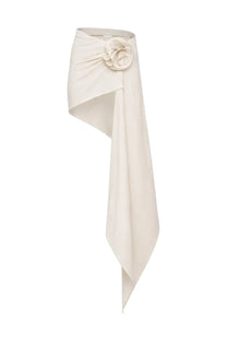 Cream-colored asymmetrical wrap mini skirt by Magda Butrym with large detailed floral embellishment at the waist