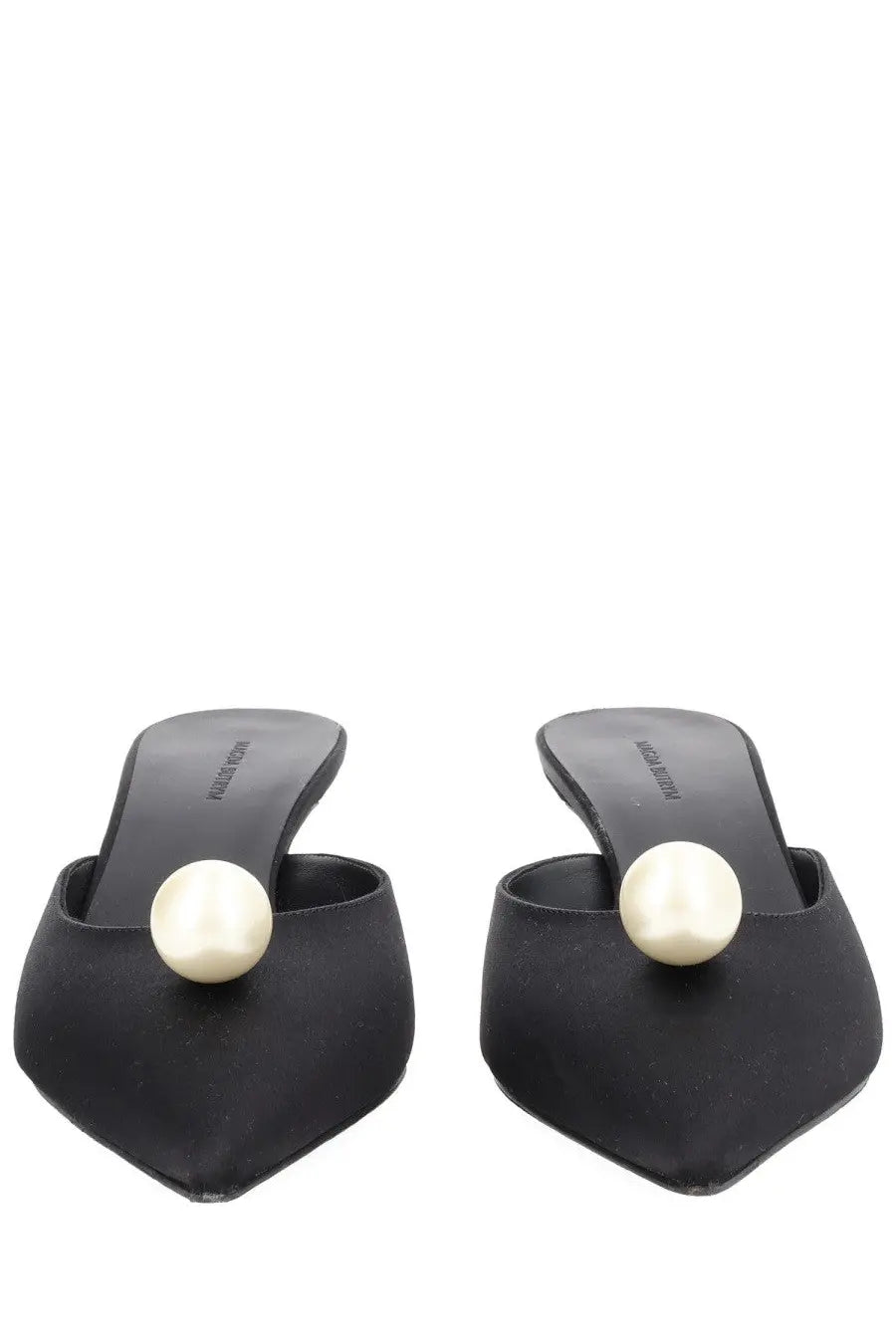 Magda Butrym women’s black satin mules featuring a prominent cream-colored pearl detail at the toe in seta con perla