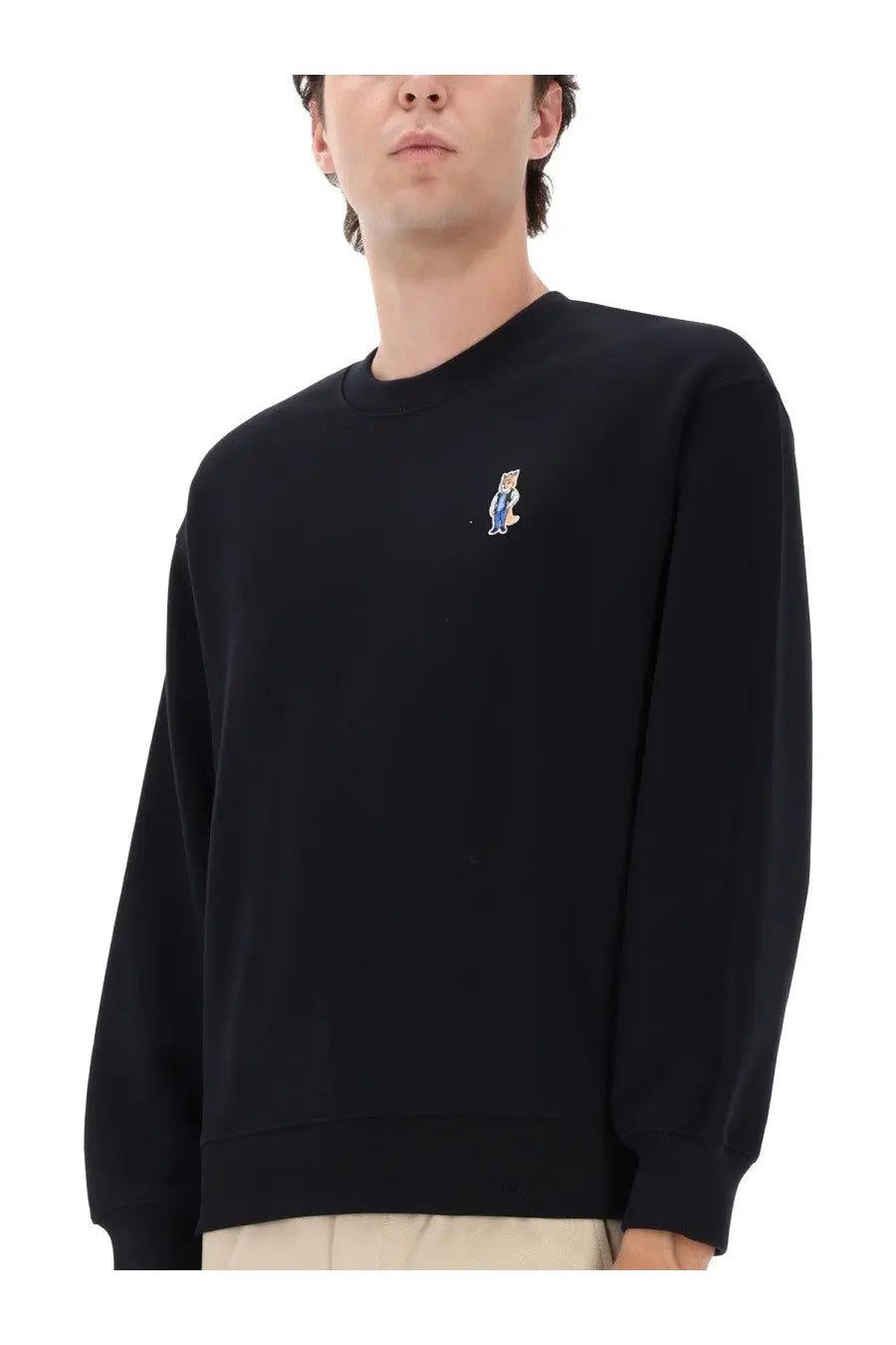 Maison Kitsuné men’s black crewneck sweatshirt with small embroidered comfort dressed fox cartoon on left chest