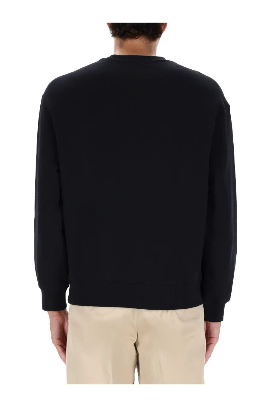 Maison Kitsuné men’s long-sleeved black crewneck sweatshirt with smooth solid fabric finish for comfort wear