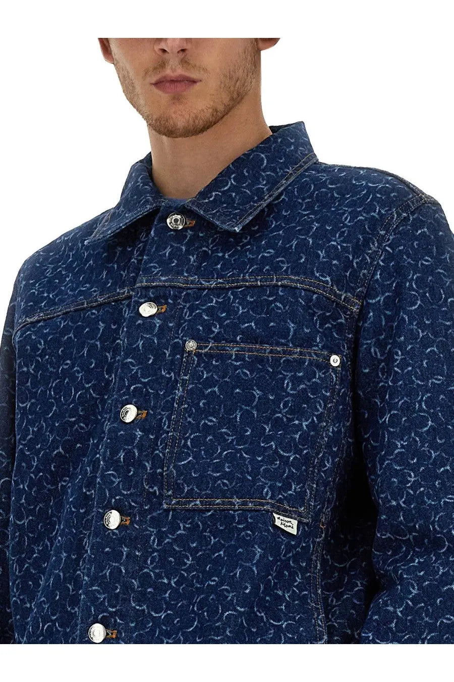 Maison Kitsuné men’s dark blue denim jacket with subtle white abstract pattern and silver-toned buttons