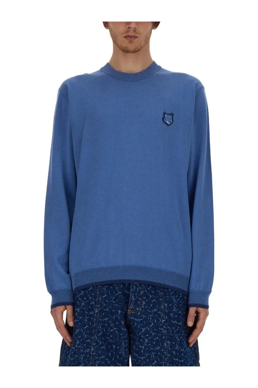 Maison Kitsuné men’s blue knit sweater with small embroidered wolf logo on left chest made from fox head jersey