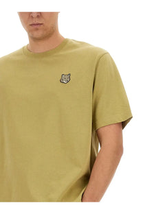 Maison Kitsuné men’s olive green cotton t-shirt with small embroidered wolf face on left chest