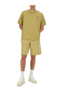 Maison Kitsuné men’s olive green short sleeve t-shirt with small embroidered fox logo on left chest