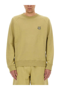 Maison Kitsuné men’s oversize olive green cotton sweatshirt with small embroidered fox logo on left chest