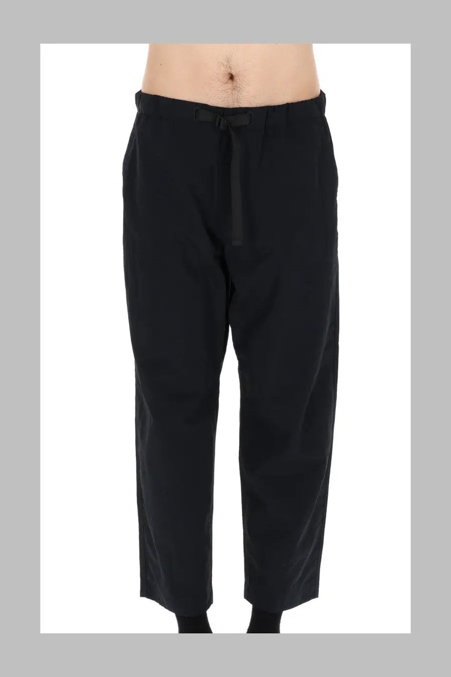 Maison Kitsuné men’s black pantalone trousers in tessuto tecnico with drawstring waistband and subtle pleats