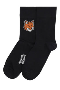 Maison Kitsuné women’s black cotton socks with pixelated orange fox face on cuff and white branding near toe