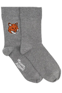 Maison Kitsuné women’s grey crew socks with knitted orange fox face and silver logo script on the heel