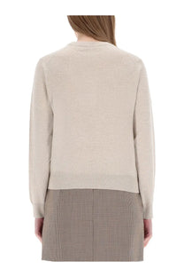 Maison Kitsuné women’s beige knit cardigan with subtle textured pattern and ribbed cuffs