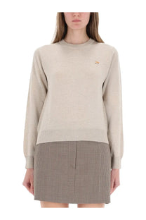Maison kitsuné women’s beige knit sweater with small embroidered fox logo on left chest in maglia baby fox design