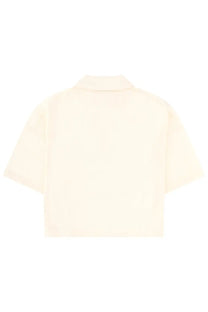 Cream-colored Maison Kitsuné women’s polo con white shirt with short sleeves classic collar and minimalist design