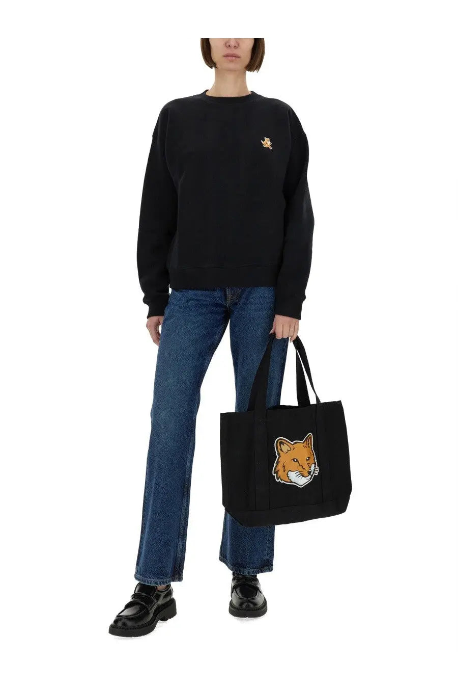 Black canvas tote bag featuring a prominent embroidered orange and white fox face for Maison Kitsuné Women