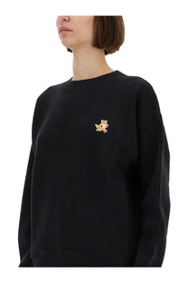 Maison Kitsuné women’s black cotton sweatshirt with small embroidered fox patch on the left chest