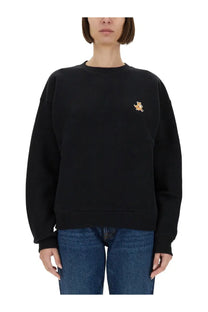 Maison Kitsuné women’s black oversized sweatshirt with small embroidered fox patch on left chest for casual wear