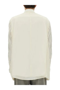 Maison Margiela men’s white anonymity of the lining jacket featuring a cream semi-sheer blouse with vertical striped sleeves