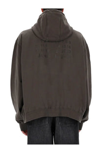 Maison Margiela men’s oversized dark olive green hoodie with hood and faded black numerical print on the back