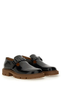 Maison margiela men’s black leather monk shoes with patent finish brown rubber sole and buckle closure