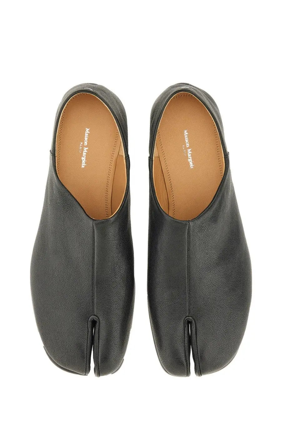 Maison Margiela men’s black leather tabi mules with minimalist design and tan leather insole displayed from the back