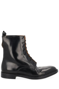 Maison Margiela men’s loved to death black leather lace-up combat boot with polished finish and brown laces