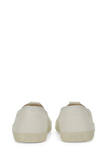 Maison Margiela men’s Mary Jane tabi cream slip-on sneakers with minimalist design rubber soles and subtle heel branding