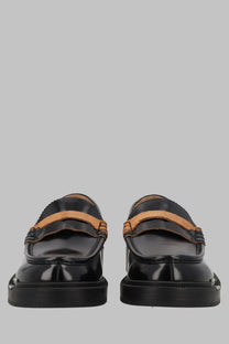 Maison Margiela men’s mocassino écortiqué black patent leather loafers with tan suede accents and chunky rubber sole