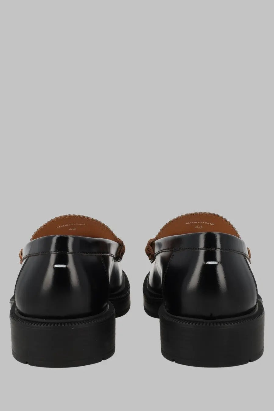 Maison Margiela men’s mocassino écortiqué black patent leather loafers with thick rubber sole and tan stitching details