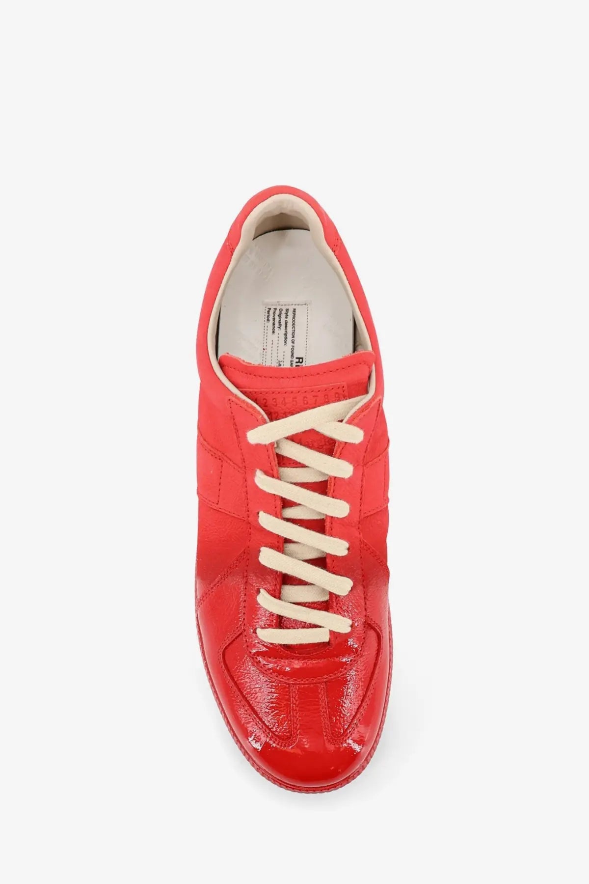 Maison Margiela men’s replica leather sneaker in vibrant red patent leather with cream laces and minimalist design