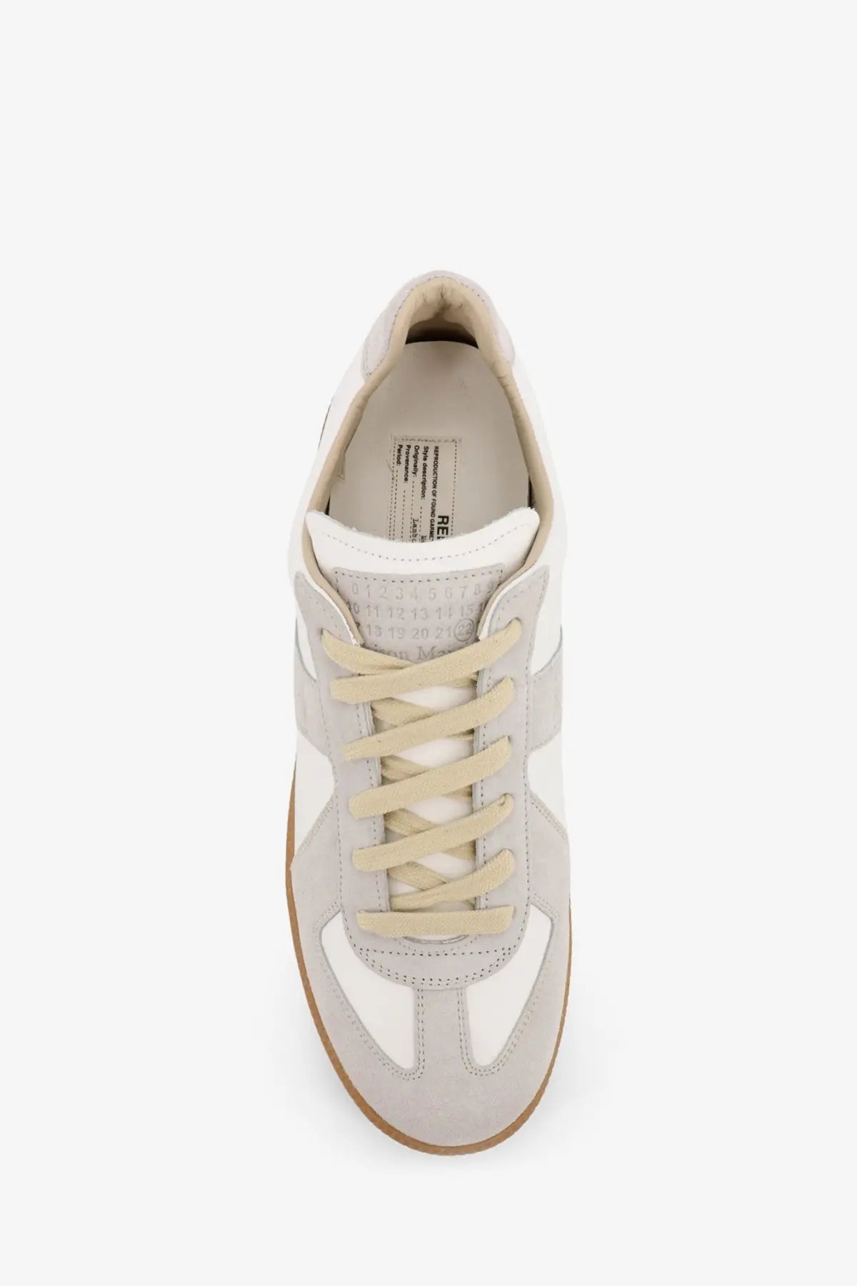 Maison Margiela men’s replica low top sneaker in white with gray suede upper beige laces and rubber sole