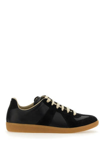 Maison Margiela men’s replica sneaker black leather with tan rubber sole and cream-colored laces