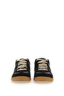 Maison Margiela men’s replica sneaker black low-top in black suede and leather with cream laces and tan rubber sole