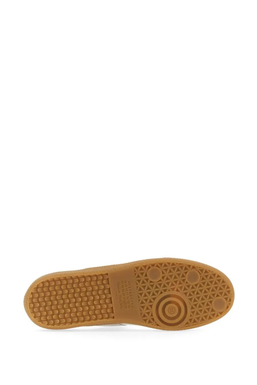 Maison Margiela men’s replica sneaker white with tan rubber sole featuring geometric tread pattern and circular logo detail