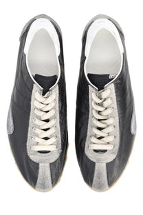 Maison Margiela men’s sneaker sprinters black with black and silver suede and white laces front view