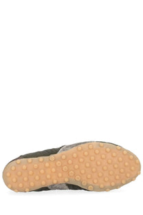 Maison Margiela men’s sneaker sprinters in olive green suede with tan rubber sole and circular tread patterns