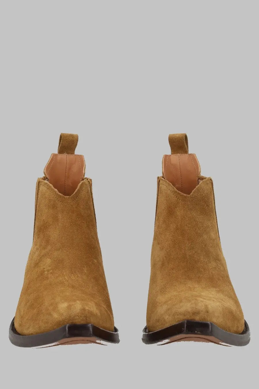 Maison Margiela men’s stivale western chelsea heel less boots in tan suede with black rubber sole and back pull tabs shown from back