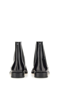 Maison Margiela men’s tabi chelsea boot black in sleek black patent leather with glossy finish and minimalist design