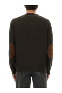 Maison Margiela men’s wool cardigan in dark olive green knit with brown suede elbow patches