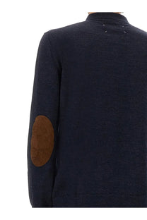 Maison Margiela men’s wool polo in dark blue with brown suede elbow patch for stylish casual wear