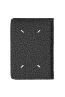 Maison Margiela unisex black card holder made of textured leather with white stitching forming a minimalist face design