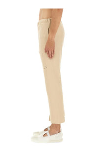 Maison Margiela unisex cotton beige cropped trousers with subtle perforated detailing and a relaxed tapered fit