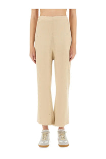 Maison Margiela unisex cotton beige high-rise cropped trousers with ribbed texture and subtle distressed detailing