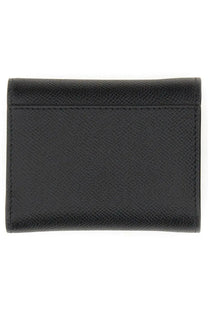 Maison Margiela unisex leather wallet black with subtle crosshatch texture and precise edge stitching
