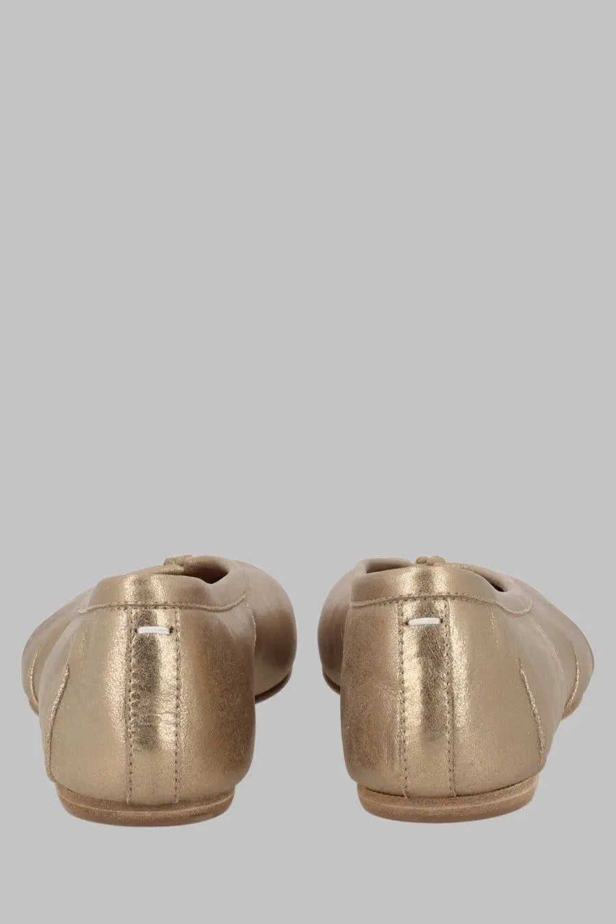 Maison Margiela women’s ballerina tabi gold metallic leather ballet flats with sleek minimalist design and subtle stitching details